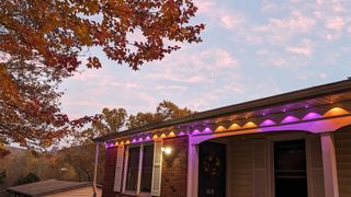 Govee Permanent Outdoor Lights on a house with Halloween colors