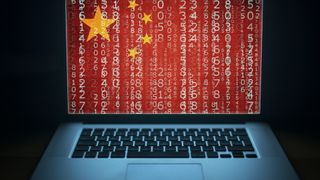 China&#039;s flag overlays laptop screen