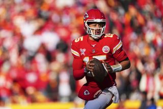 Patrick Mahomes of NFL team Kansas City Chiefs runs with the ball during a match against the Houston Texans 