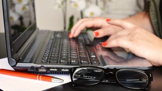 Woman working on laptop