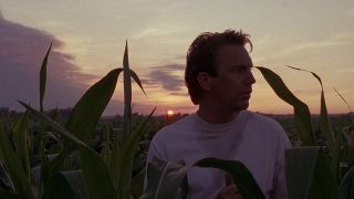 Kevin Costner in a corn field in Field of Dreams 