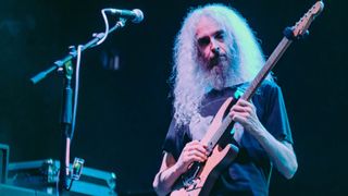 Guthrie Govan contemplates his work as he plays a solo on his signature Charvel electric guitar during his performance at the Café Iguana in Monterrey, Mexico. 