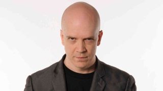 Devin Townsend posing for a photograph in 2012