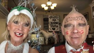 Toyah Willcox and Robert Fripp in Christmas-themed attire 