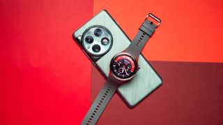 OnePlus Watch 2 lying across OnePlus 12