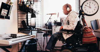 Man in wheelchair makes music