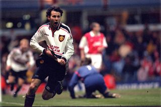 Ryan Giggs celebrates after scoring his iconic winning goal for Manchester United against Arsenal in the 1999 FA Cup semi-final replay at Villa Park