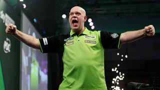 Michael van Gerwen celebrates winning his PDC World Darts Championships quarter final and proceeding to the semi final