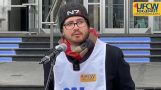 Former Keywords Studios employee James Russwurm addresses striking workers at BioWare headquarters in Edmonton