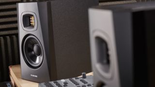 A pair of Adam Audio T5V studio monitors in a studio