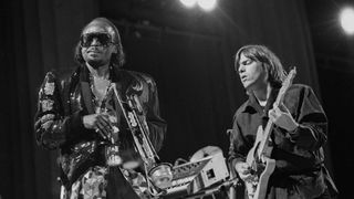 Miles Davis, performing with guitarist Mike Stern, at the Greek Theater in Berkeley, California on September 1, 1985