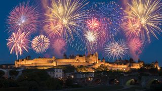 Fireworks over Carcassonne on July 14th, France?s national day. The Cité de Carcassonne is a medieval fortress restored by the theorist and architect Eugène Viollet-le-Duc in 1853 and added to the UNESCO list of World Heritage Sites in 1997.