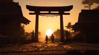 Naoe and Yasuke walk in the sunset in a screenshot from Assassin&#039;s Creed Shadows