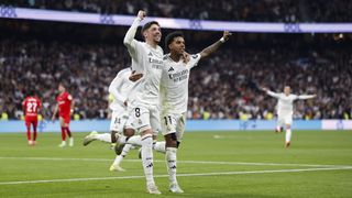 Real Madrid players celebrate a goal during a La Liga match