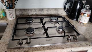 Image shows a gas stove top.