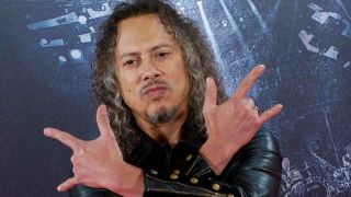 Metallica’s Kirk Hammett posing for a photograph in 2011