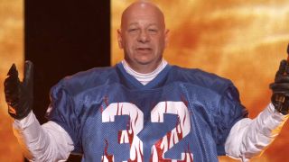 Jeff Ross wearing flaming &quot;Roast J. SImpson&quot; jersey and gloves in the Roast of Tom Brady