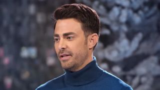 Jonathan Bennett on Mr. Christmas talking to contestants.