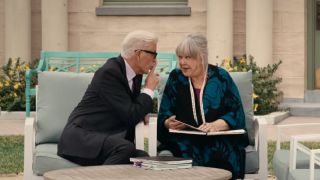 Charles and Gladys talking together in the courtyard in A Man on the Inside.