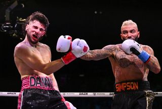 Danny Simpson, right, in action against Danny Aarons in their light heavyweight bout during the Misfits Boxing &amp; DAZN X Series at the 3Arena in Dublin