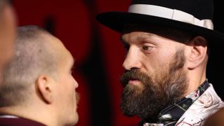 Oleksandr Usyk (left) and Tyson Fury face off during a press conference as part of Oleksandr Usyk v Tyson Fury 2 at Via Riyadh on December 19, 2024 in Riyadh, Saudi Arabia. 