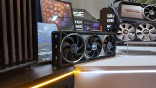 The Asus ROG Astral GeForce RTX 5090 on an LED-lit table at CES 2025