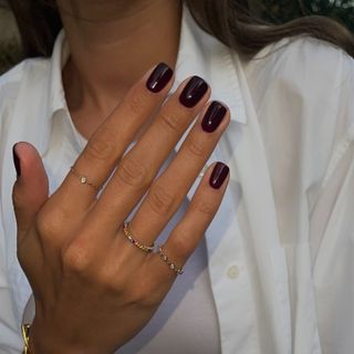 Photo of black cherry nails