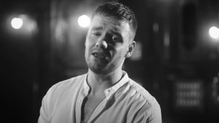 Liam Payne sings in the &quot;All I Want (For Christmas)&quot; music video