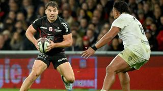 Antoine Dupont playing rugby for Toulouse