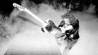 Ritchie Blackmore smashing his guitar onstage