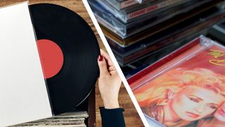 A hand taking a vinyl record out of a sleeve next to a stack of CDs