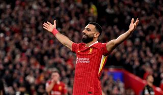 Mohamed Salah of Liverpool celebrating after scoring the second goal against Bologna in the Champions League.