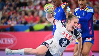 Norways line player Vilde Mortensen Ingstad (C) shoots the ball during the EHF Womens European Championship semi-final handball match between Norway and France ahead of the European Women&#039;s Handball Championship 2024