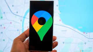 Google Maps logo on a phone screen