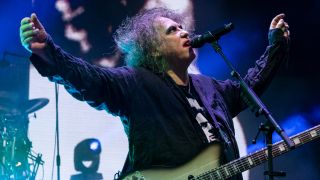 Robert Smith onstage with The Cure in 2023