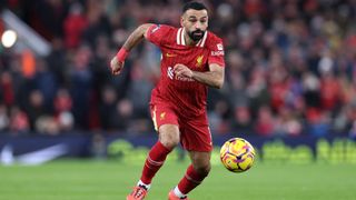 Mo Salah of Liverpool FC runs with the ball during a Premier League match