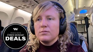 Woman wearing Dell Premier Wireless ANC Headset WL7024 ion a plane and a graphic saying &quot;Cyber Monday Deals.&quot; 