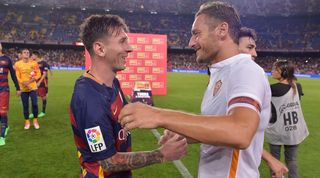 Lionel Messi and Francesco Totti chat after a Gamper Trophy clash between Barcelona and Roma in August 2015.