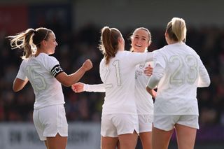 Lia Waelti of Arsenal celebrates with teammates Katie McCabe, Victoria Pelova, and Alessia Russo after scoring the team&#039;s second goal during the Adobe Women&#039;s FA Cup Fourth Round match between Arsenal Women and Watford Women at Meadow Park on January 14, 2024 in Borehamwood, England.