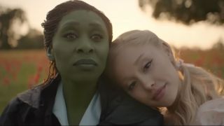 Ariana Grande&#039;s head on Cynthia Erivo&#039;s shoulder in Wicked