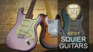 Three Squier guitars leaning against a wall