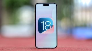 iOS 18 logo on an iPhone 15 Pro