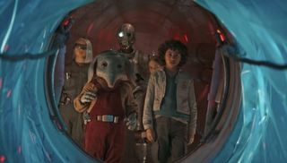 Three kIds, an alien, and a droid aboard a spaceship