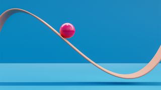 Computer generated image of pink sphere rolling down a plane like a roller coaster.