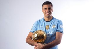 Rodri holding the Ballon d&#039;Or