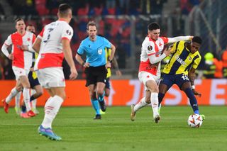 Fenerbahce&#039;s Brazilian midfielder #13 Fred (R) and Slavia Prague&#039;s Greek midfielder #10 Christos Zafeiris (2R) vie for the ball during the UEFA Europa League football match between Slavia Prague and Fenerbahce SK in Prague, Czech Republic on November 28, 2024. 