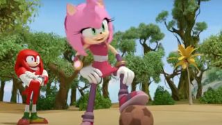 Amy Rose with her foot planted on a soccer ball in Sonic Boom