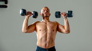 Man doing a dumbbell workout