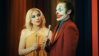 Harley Quinn (Lady Gaga) and Arthur Fleck (Joaquin Phoenix) prepare to entertain a crowd in Joker: Folie À Deux trailer