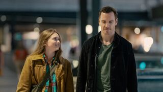 India Fowler as Poppy and Michael Fassbender as Martian in The Agency